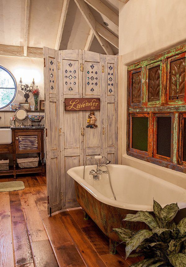 Shabby chic bathroom with vintage bathtub