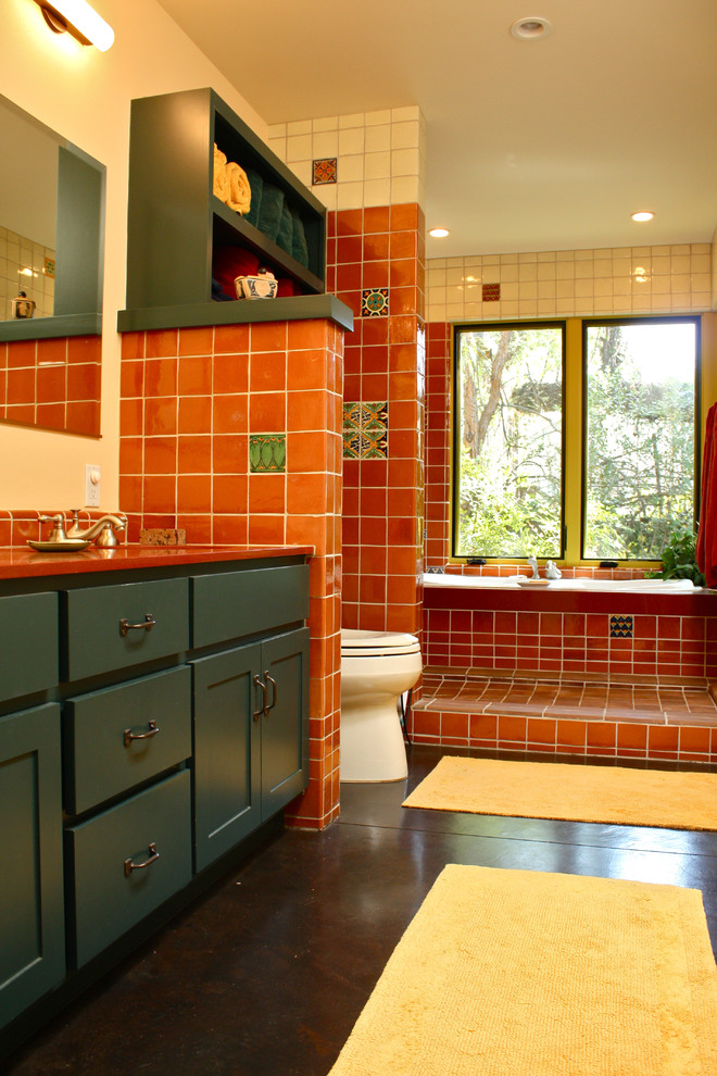Southwestern Bathroom with Green Bathroom Cabinets