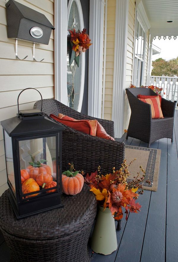 Fall porch decorations can be easily transformed into Halloween