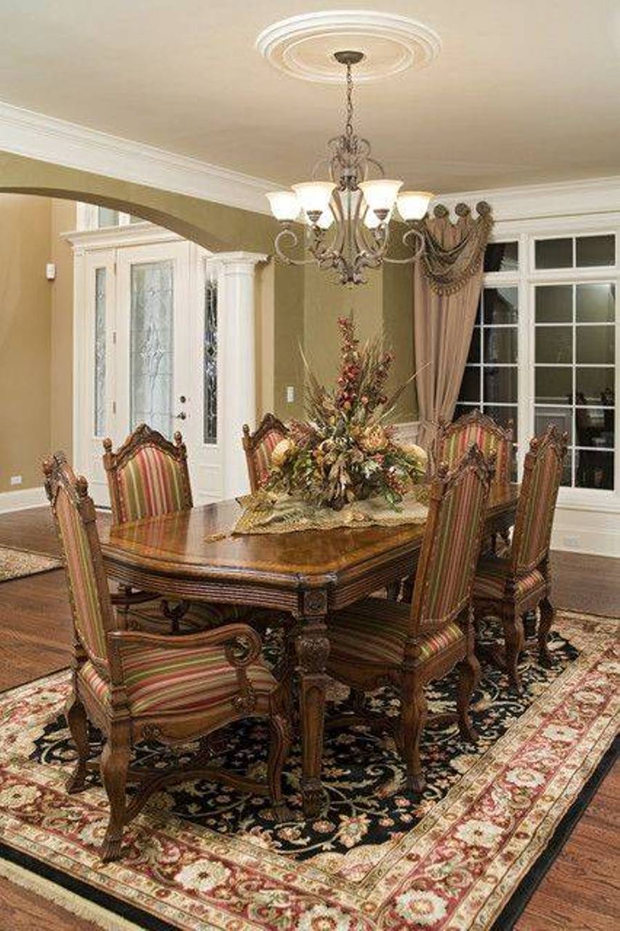 Traditional Dining Room With Chandelie