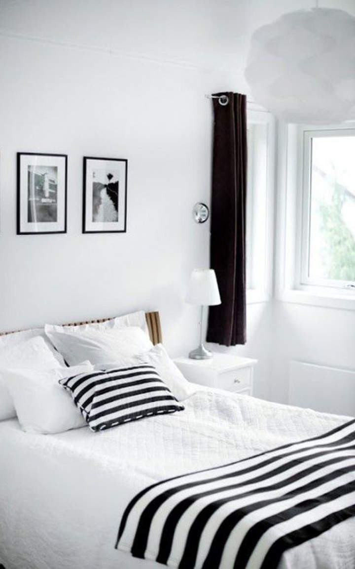 White Bedroom Design With Black Pillo and Bed Sheet