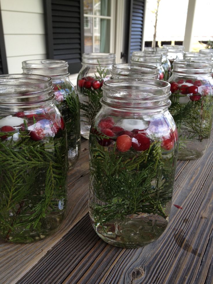 mason-jars-with-cranberries-and-candles
