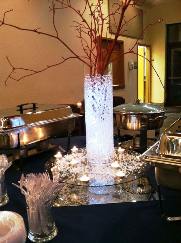 vase-centerpieces-with-branches-and-water