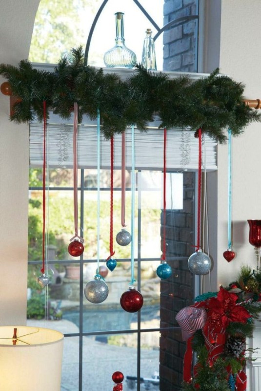 ornaments-and-garland-above-window-living-room-ideas
