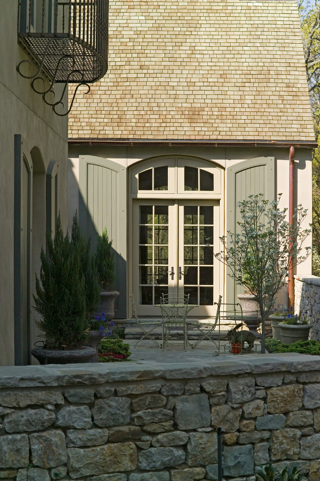 Eclectic Exterior Design with Shutters