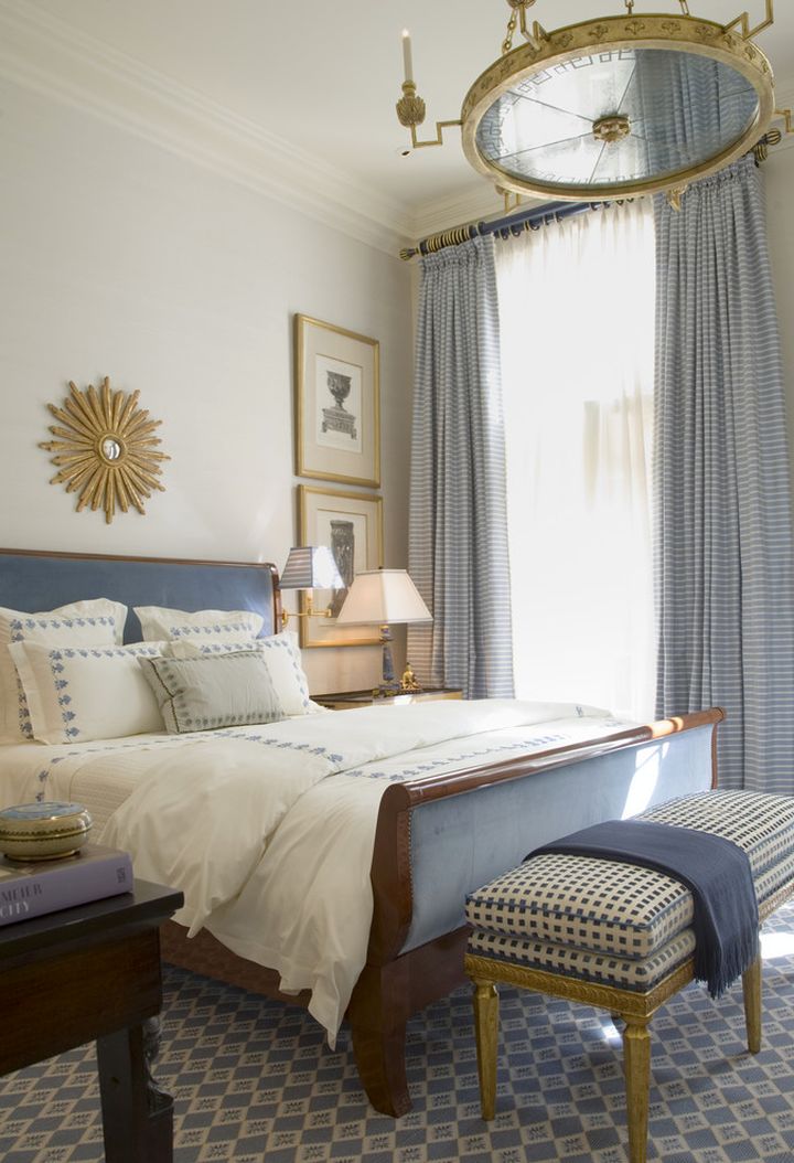 blue and gold bedroom with chandelier for guest bedrooms