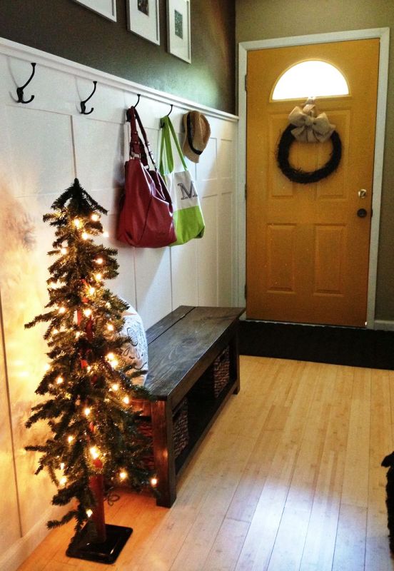tall-skinny-christmas-tree-in-entryway